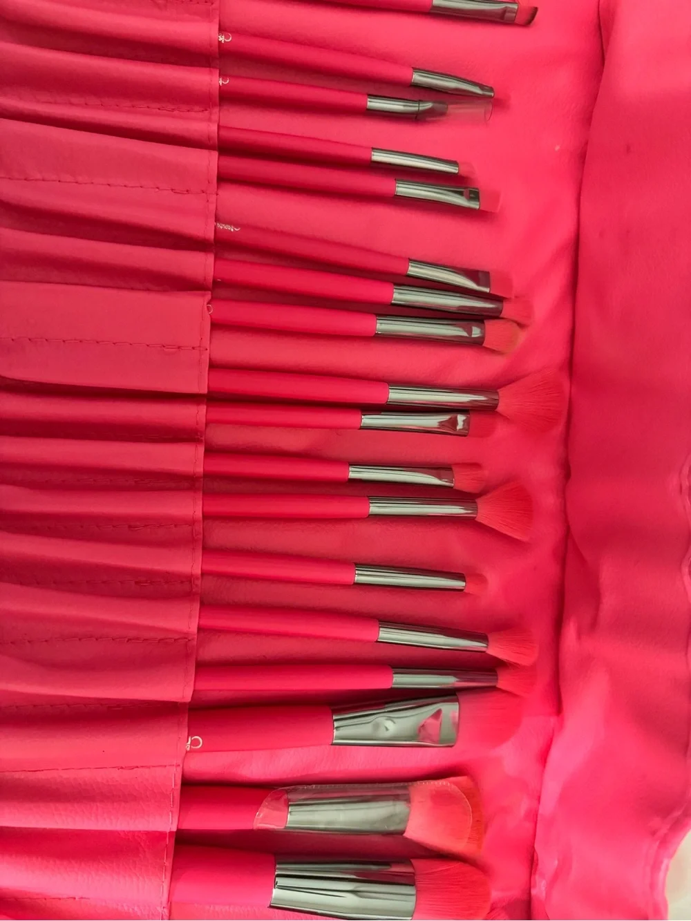 Hot pink Beauty creations makeup brushes
